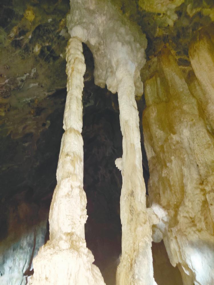$!Over time, a stalactite joins a stalagmite to become a column.