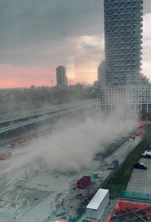 A dust cloud swrils in the wind in Toronto, Canada May 21, 2022, in this screengrab obtained from social media video. Dr. Liza Egbogah/via REUTERSpix