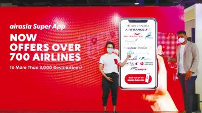 Woo and Rajiv introducing AirAsia’s new airline partners on the app