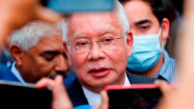 Previous PM Najib Razak raises issue over McDonald's rise in rates