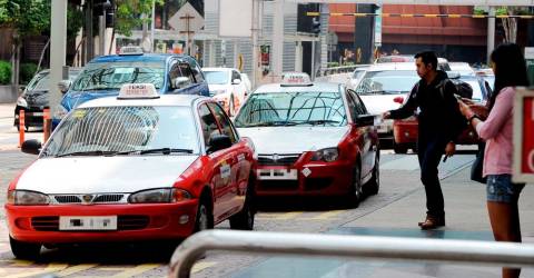 Rush-hour e-hailing fare hike prompts passengers to opt for taxis