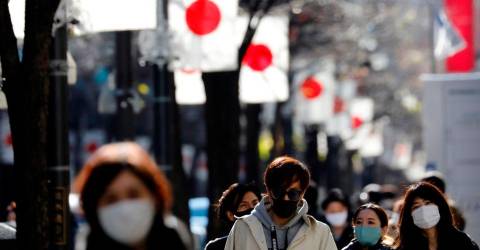 Japan to consider downgrading Covid-19 to less serious infectious disease