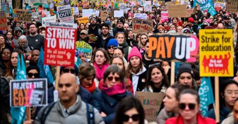 Half a million strike in UK as cost-of-living crisis bites