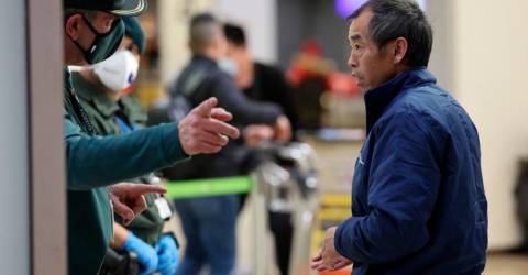 More countries roll out China traveller checks amid Covid surge