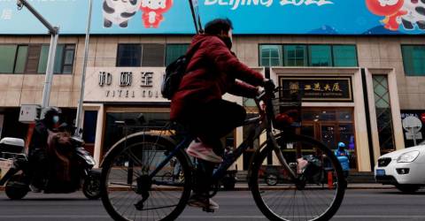 La ville de Pékin appelle à moins de voyages de vacances pour réduire les risques de Covid