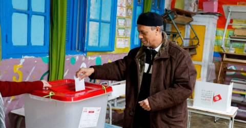 Tunisians vote in second round of poll for defanged parliament