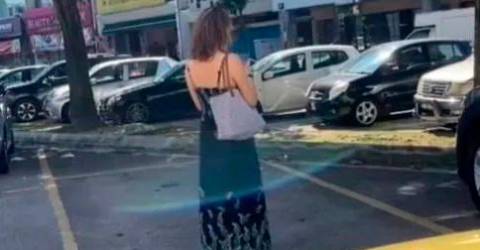 Une femme met les internautes en colère en agissant comme un « parking humain »