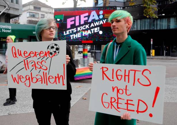 Participants display placards as LGBT+ associations protest in front of FIFA World Football Museum, as Qatar is set to host the 2022 World Cup, in Zurich, Switzerland/REUTERSPix