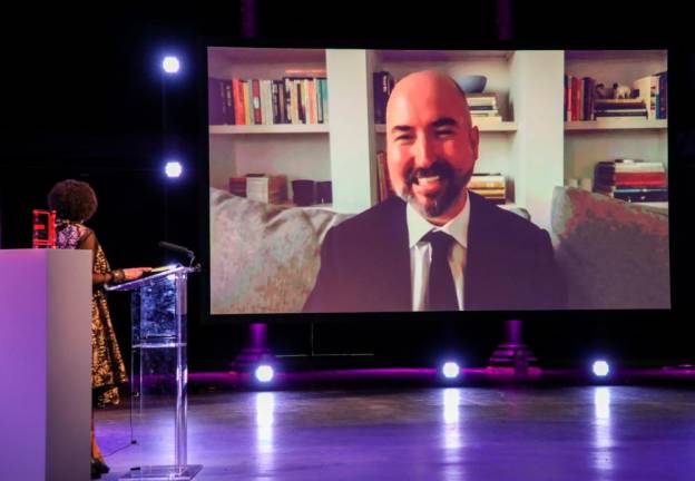 In this handout image released by the Booker Prize on November 19, 2020 Winning Author Douglas Stuart is seen on screen at The 2020 Booker Prize Awards Ceremony, broadcast in partnership with the BBC, at the Roundhouse in London. -AFP PHOTO / THEBOOKERPRIZES