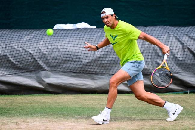 Spain’s Rafael Nadal returns the ball during a training session during the 2022 Wimbledon Championships at The All England Tennis Club in Wimbledon/AFPPix