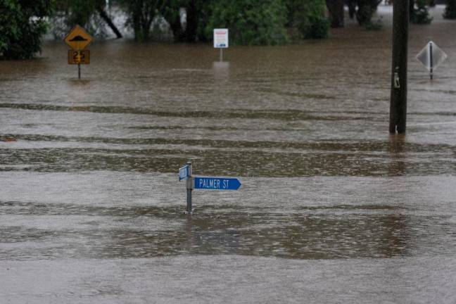 Australian floods kill 2, more evacuations as clean-up begins