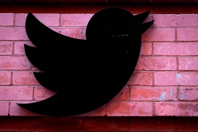 FILE PHOTO: The Twitter logo is seen outside the offices in New York City, U.S., November 9, 2022. - REUTERSPIX