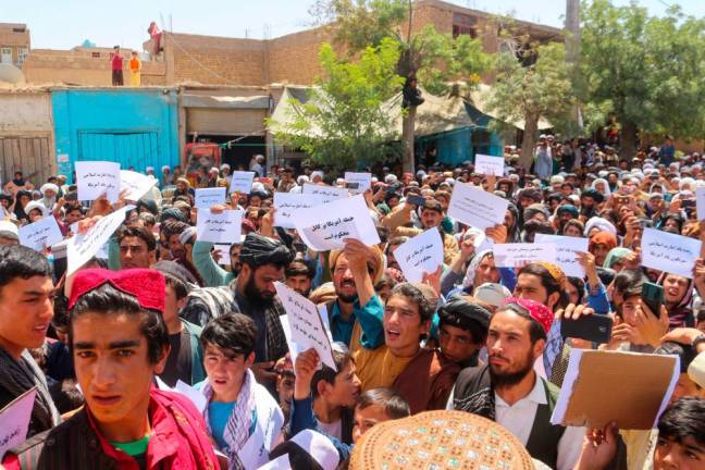 Afghans shout anti-US slogans during a demonstration to protest against a recent US drone strike in Kabul after the Friday noon prayer in Badghis/AFPPix