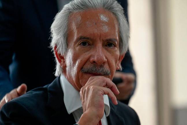 Guatemalan journalist Jose Ruben Zamora, president of the newspaper El Periodico, speaks with journalists during a break of his hearing at the Justice Palace in Guatemala City, on August 8, 2022. - AFPPIX
