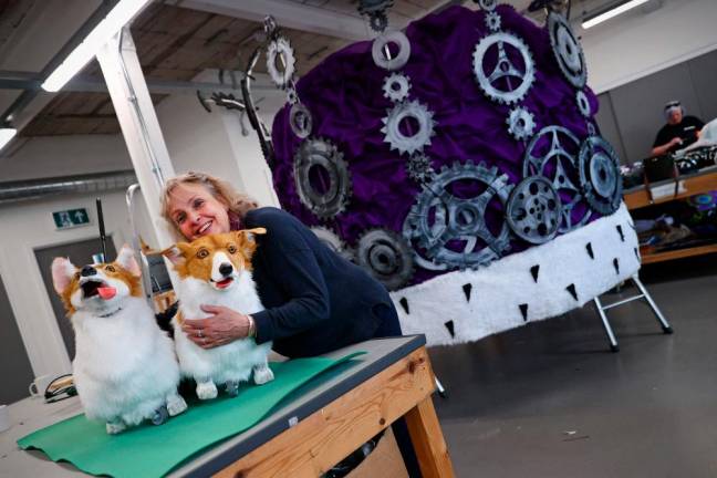 Corgi dogs, horses and swans are all being put through their paces in a historic warehouse in Coventry ahead of their starring roles in a parade to mark Queen Elizabeth II’s 70-year reign/AFPPix