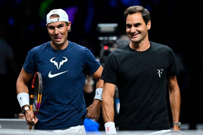 Switzerland’s Roger Federer (R) and Spain’s Rafael Nadal attend a practice session ahead of the 2022 Laver Cup at the O2 Arena in London/AFPPix