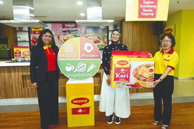(left to right) Nestle Malaysia Berhad’s Business executive ffficer Geetha Balakrishnan, Sheila Rusly and Wong Mei Ching at the launch of MAGGI Sajian Seimbang Tanda Sayang campaign.