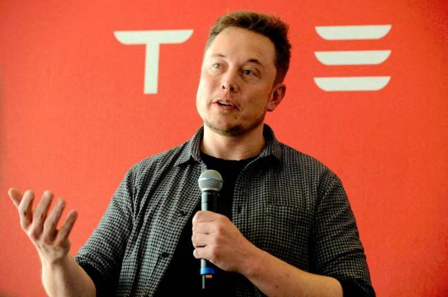FILE PHOTO: Founder and CEO of Tesla Motors Elon Musk speaks during a media tour of the Tesla Gigafactory in Sparks, Nevada, U.S.. - REUTERSpix