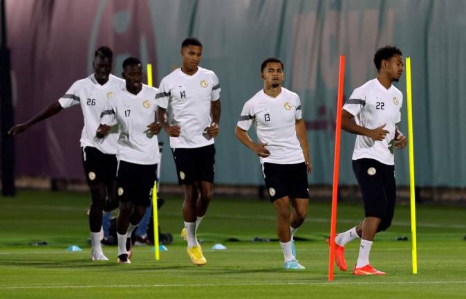FIFA World Cup Qatar 2022 - Senegal Training - Al Duhail SC 2, Doha, Qatar - November 20, 2022 Senegal’s Ismail Jakobs with teammates during training/REUTERSPix