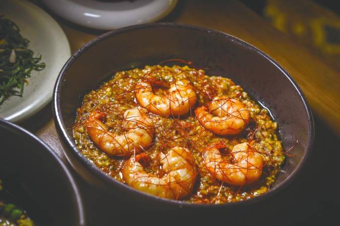 A crowd pleaser ... Tiger Prawns in Sa Fregula with tomato and capers.