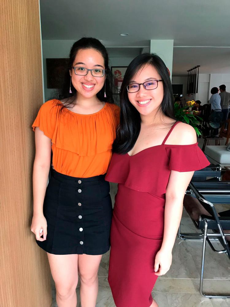 $!Ariana Ng (in orange) considers herself lucky for having her friend Melina by her side.