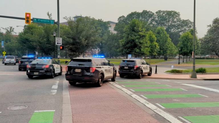 Police vehicles are seen parked near a park where, according to the police, a gunman opened fire, in Richmond, Virginia US JUNE 6, 2023. REUTERSPIX