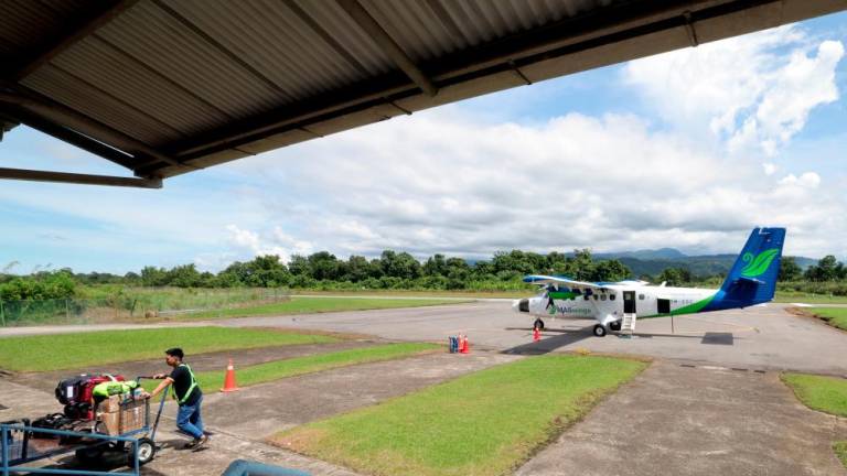 The Twin-Otter small airplane at the Lawas Airport located in Sarawak’s northern region. - BERNAMAPIX