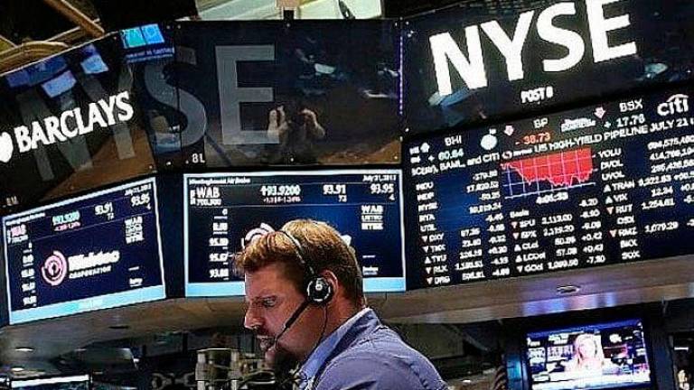 Investors say market moves may be relatively muted until companies report quarterly results in the coming weeks. – AFPpic