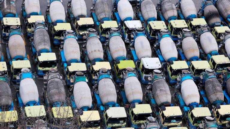 Concrete mixer trucks are parked at a factory due to a strike by a truckers’ union in Anyang, South Korea November 28, 2022. REUTERSPIX
