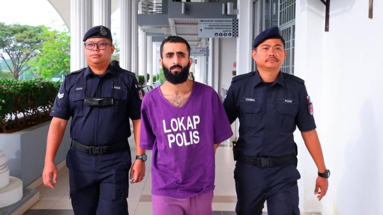 SEPANG, 27 Jan -- A Yemeni man, Abdul Aziz Musaed Ahmed, 23, faces the death penalty after being charged in the Sessions Court today on three charges of trafficking more than 200 kilograms of cannabis. BERNAMAPIX