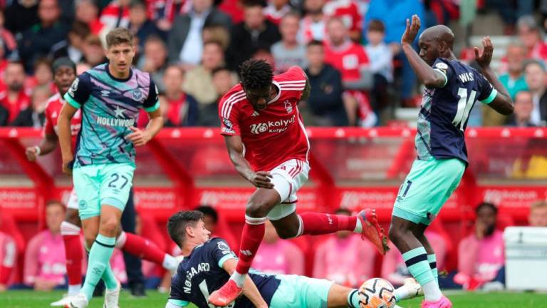 Football - Premier League - Nottingham Forest v Brentford - The City Ground, Nottingham, Britain - October 1, 2023 Nottingham Forest’s Ibrahim Sangare in action with Brentford’s Yoane Wissa and Christian Norgaard. REUTERSPIX