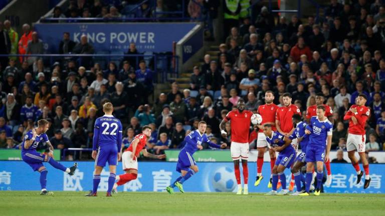 Leicester City's James Maddison scores their third goal from a free kick/REUTERSPIX