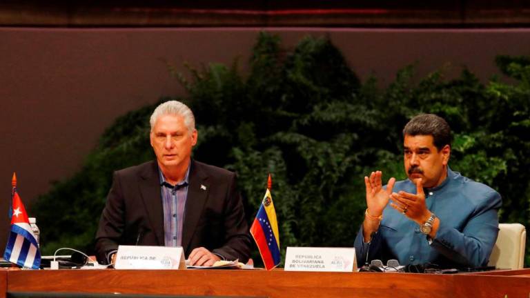 Cuba’'s President Miguel Diaz-Canel delivers a speech as Venezuela's President Nicolas Maduro reacts during the ALBA group meeting in Havana, Cuba, May 27, 2022. REUTERSpix