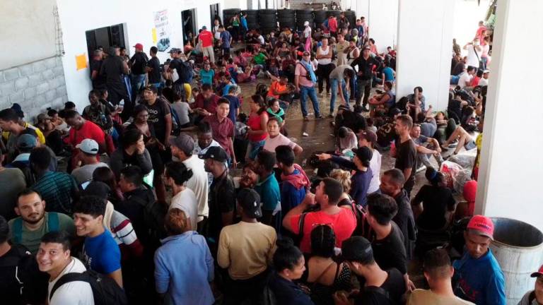 Migrants wait to buy bus tickets at the bus station in the city of Juchitan, Oaxaca State, on September 29, 2023. In the last 11 months, at least 1.8 million people have reached the southern US border, many of them searching for safety and economic opportunities. AFPPIX