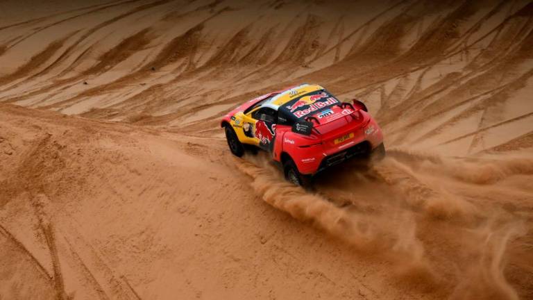 BRX’s French driver Sebastien Loeb and Belgian co-driver Fabian Lurquin compete during Stage 8 of the Dakar 2023 between Al Duwadimi and Riyadh, Saudi Arabia, on January 8, 2023/AFPPix