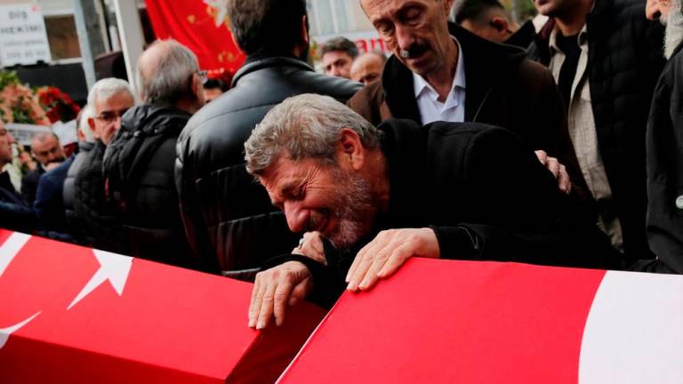 Abdi Koseoglu, father of Mukaddes Elif Topkara and father-in-law of Adem Topkara, two of the six victims of Sunday’s blast that took place on Istiklal Avenue, mourns during their funeral ceremony in Istanbul, Turkey, November 14, 2022. REUTERSPIX