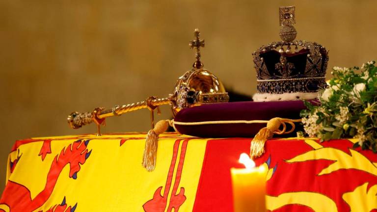 The Imperial State Crown lays atop the coffin of Queen Elizabeth II as it Lies in State inside Westminster Hall, at the Palace of Westminster in London on September 15, 2022. AFPPIX