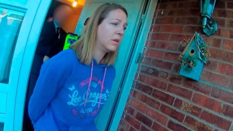 Filepix: A handout image taken from police bodycam footage released by Cheshire Constabulary police force in Manchester on August 17, 2023, shows the nurse Lucy Letby being arrested at home in Chester on July 3, 2018/AFPPix