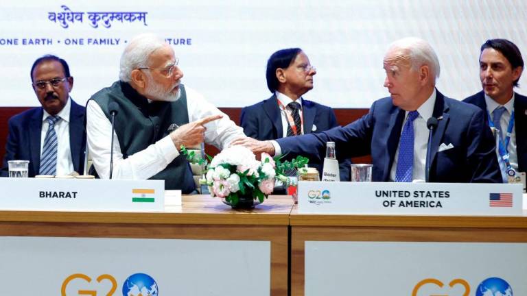 FILE PHOTO: U.S. President Joe Biden and Indian Prime Minister Narendra Modi attend Partnership for Global Infrastructure and Investment event on the day of the G20 summit in New Delhi, India, September 9, 2023. REUTERSPIX