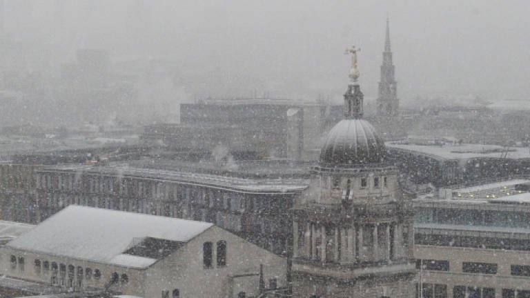 Heavy snow causes travel mayhem in northern Europe