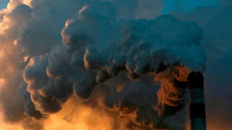 Smoke and steam billowing from a coal-fired power plant in Poland. Picture taken in November 2018. Without collaboration to develop and share new clean energy technology, the transition to net zero emissions will be much more challenging and could be delayed by decades, the IEA says. – Reuterspix