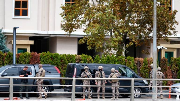 Members of the Turkish Police Special Forces stand guard in front of the Interior Ministry following a bomb attack in Ankara, Turkey October 1, 2023. - REUTERSPIX