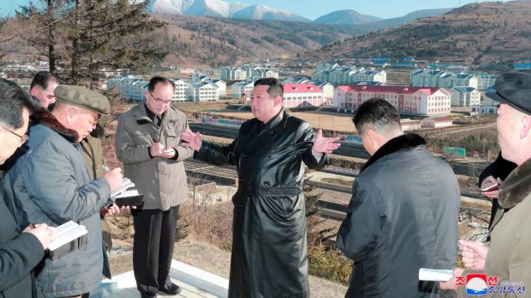 North Korean leader Kim Jong Un gives field guidance during a visit to Samjiyon City, North Korea in this undated photo released on November 16, 2021 by North Korea's Korean Central News Agency - REUTERSPIX