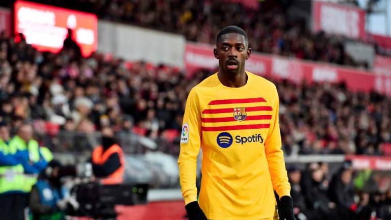 Barcelona's French forward Ousmane Dembele reacts during the Spanish League football match between Girona FC and FC Barcelona at the Montilivi stadium in Girona on January 28, 2023. - AFPPIX