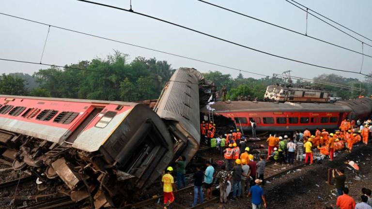 At least 288 people were killed and more than 850 injured in a horrific three-train collision in India, officials said on June 3, the country's deadliest rail accident in more than 20 years//AFPix