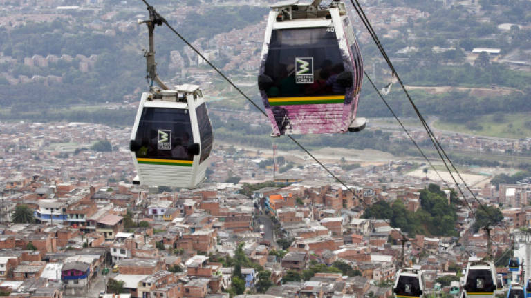Colombia's Medellin rides cable car to a better future