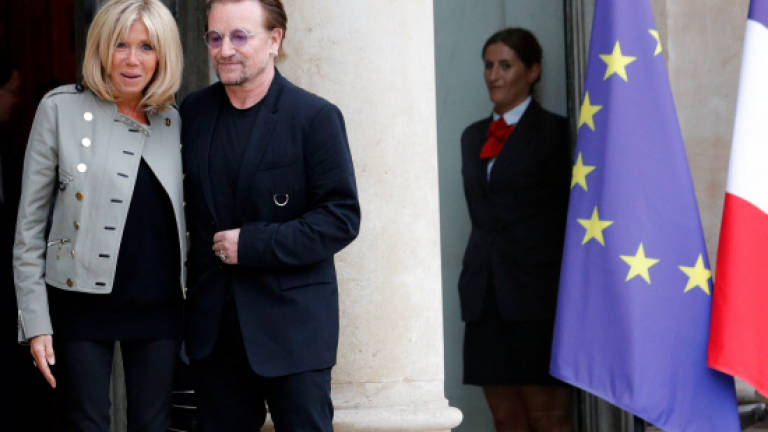 U2 singer Bono talks development aid with French president Macron