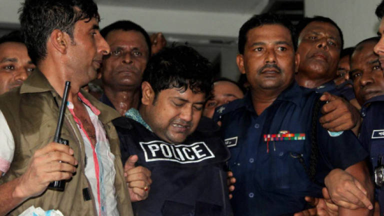 Bangladesh charges Rana Plaza owner and 40 others with murder