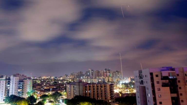 Israel’s Iron Dome anti-missile system intercept rockets launched from the Gaza Strip, as seen from the city of Ashkelon, Israel//Reuterspix