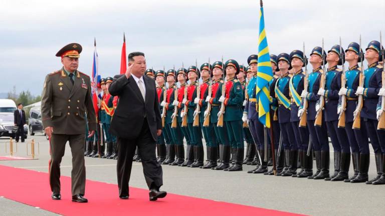 h Korea’s leader Kim Jong Un (R) and Russia’s Defence Minister Sergei Shoigu (L) inspect Russian honour guards as they arrive at Knevichi aerodrome near Vladivostok, Primorsky region, on September 16, 2023. AFPPIX